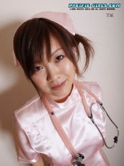 Sexy asian nurse in pink dress