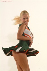 Cheerleader in green skirt show white panty