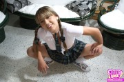 Young schoolgirl in short skirt