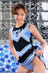 Pretty Asian Girl In Her Blue Cheerleader Uniform