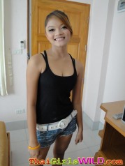Cute Thai girl with braces takes some self shot photos
