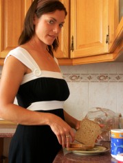 Sexy Brunette In The Kitchen Playign With Her Pussy